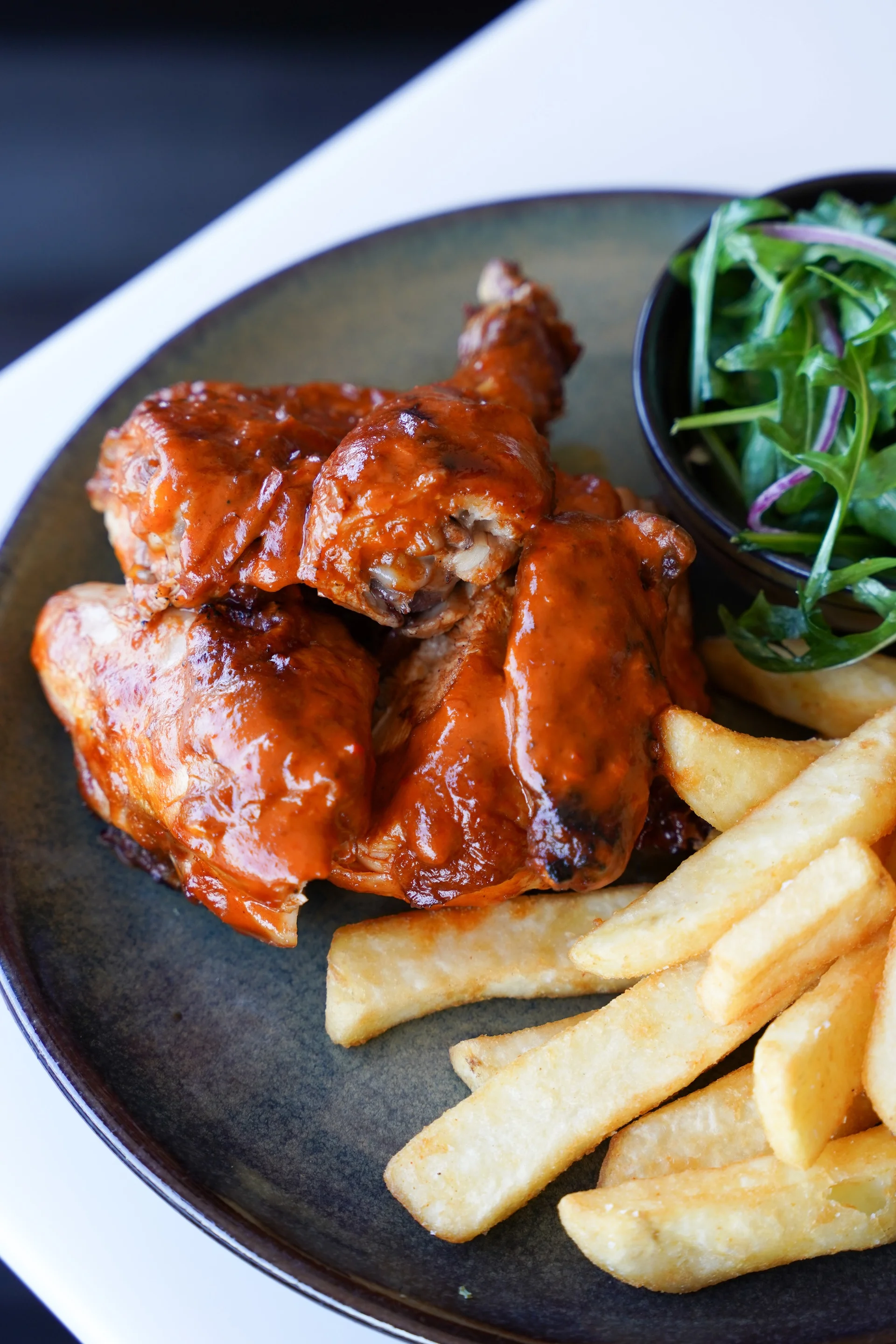 Barbecue chicken with chips and garden salad at Waterbar & Grill Steakhouse, Cairns