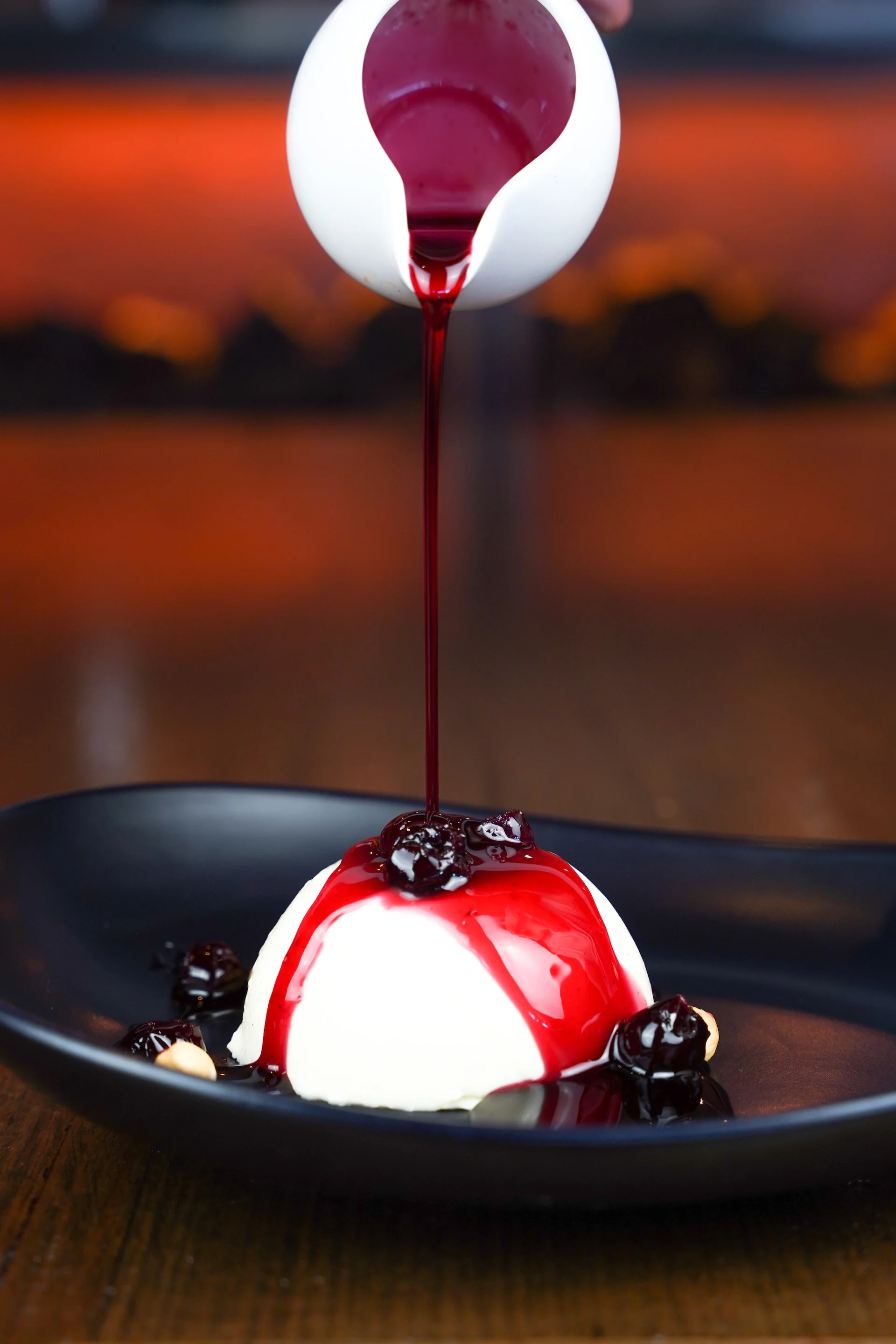 Panna cotta with berry coulis at Waterbar & Grill Steakhouse, Cairns